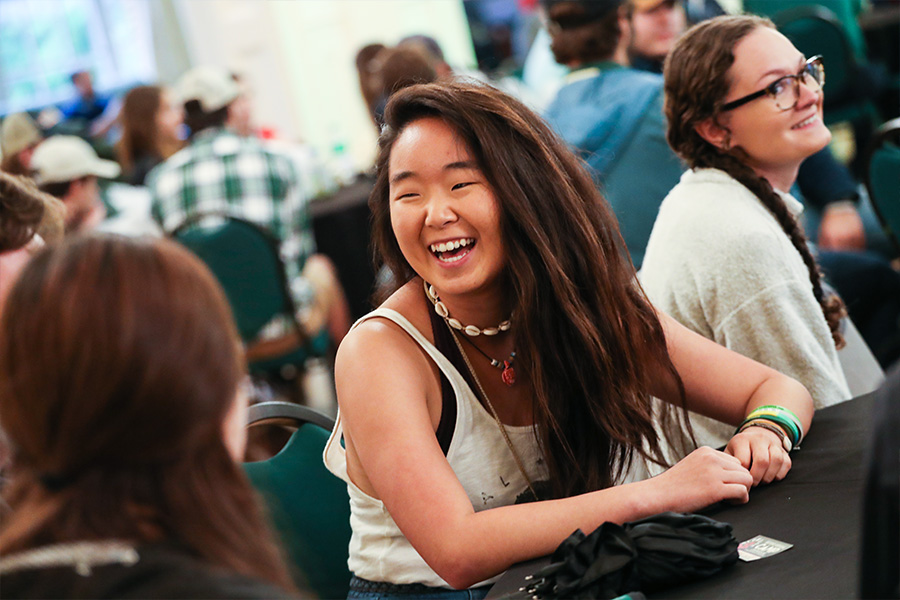 student laughing at event