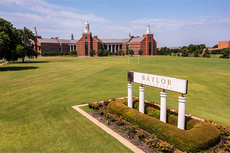 Baylor University sign with Baylor Science Building in the background